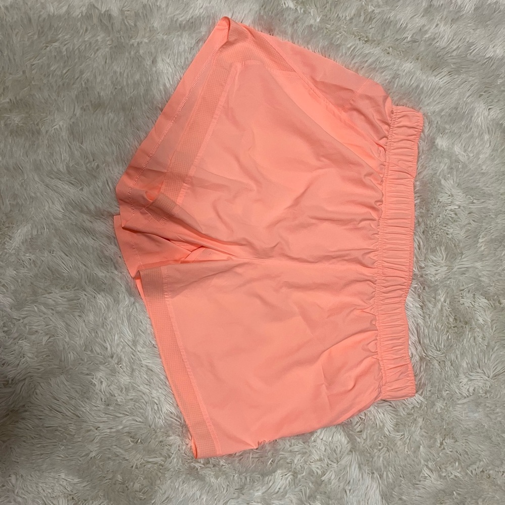 Peach colored size large womens shorts